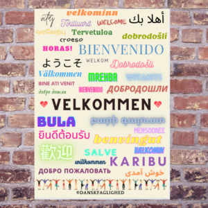 Velkommen – plakat med ordet “Velkommen” på mange sprog